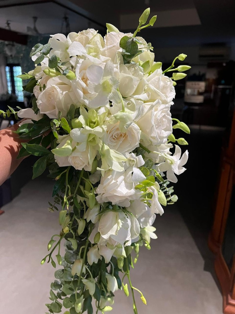 White rose and dendrobium orchid cascading bridal bouquet